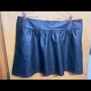 Pleather black faux leather mini skirt pockets American eagle business punk goth